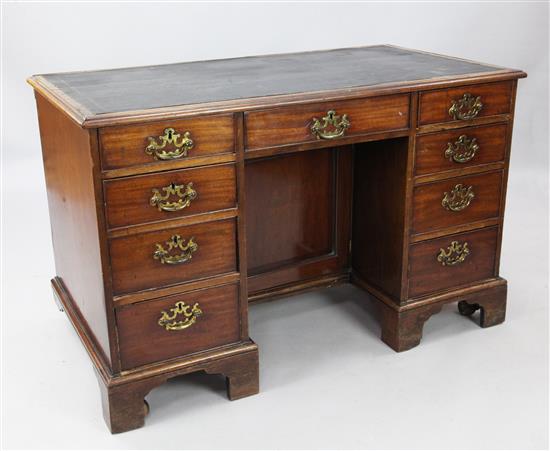 A George III mahogany kneehole desk, W. 4ft 2in. D. 2ft 3in. H. 2ft 8in.